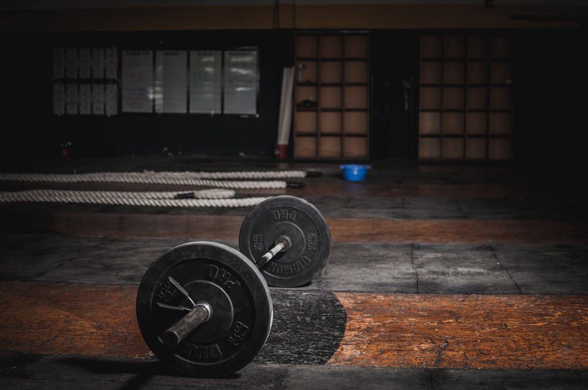 Athlete training with dumbbells